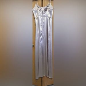 Gorgeous champagne gown with split up the front, zipper back closure size 2